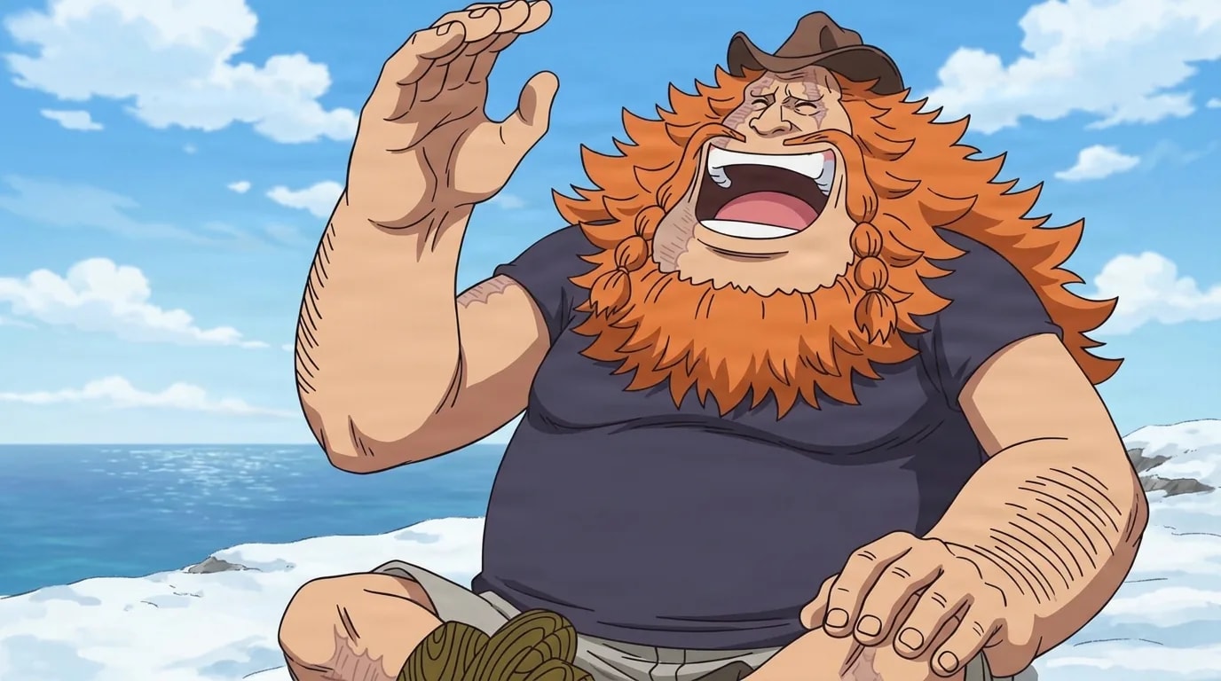 Orange maned giant in a small brown hat laughs with one hand raised on a snowy seaside coast under a blue sky